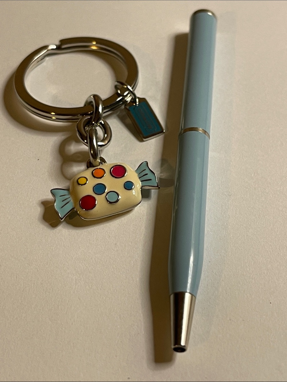 Coach Polished Silver Keyring with Candy Charm and Coach Pen